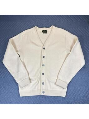 Vintage Sears knit cardigan in a soft cream tone.